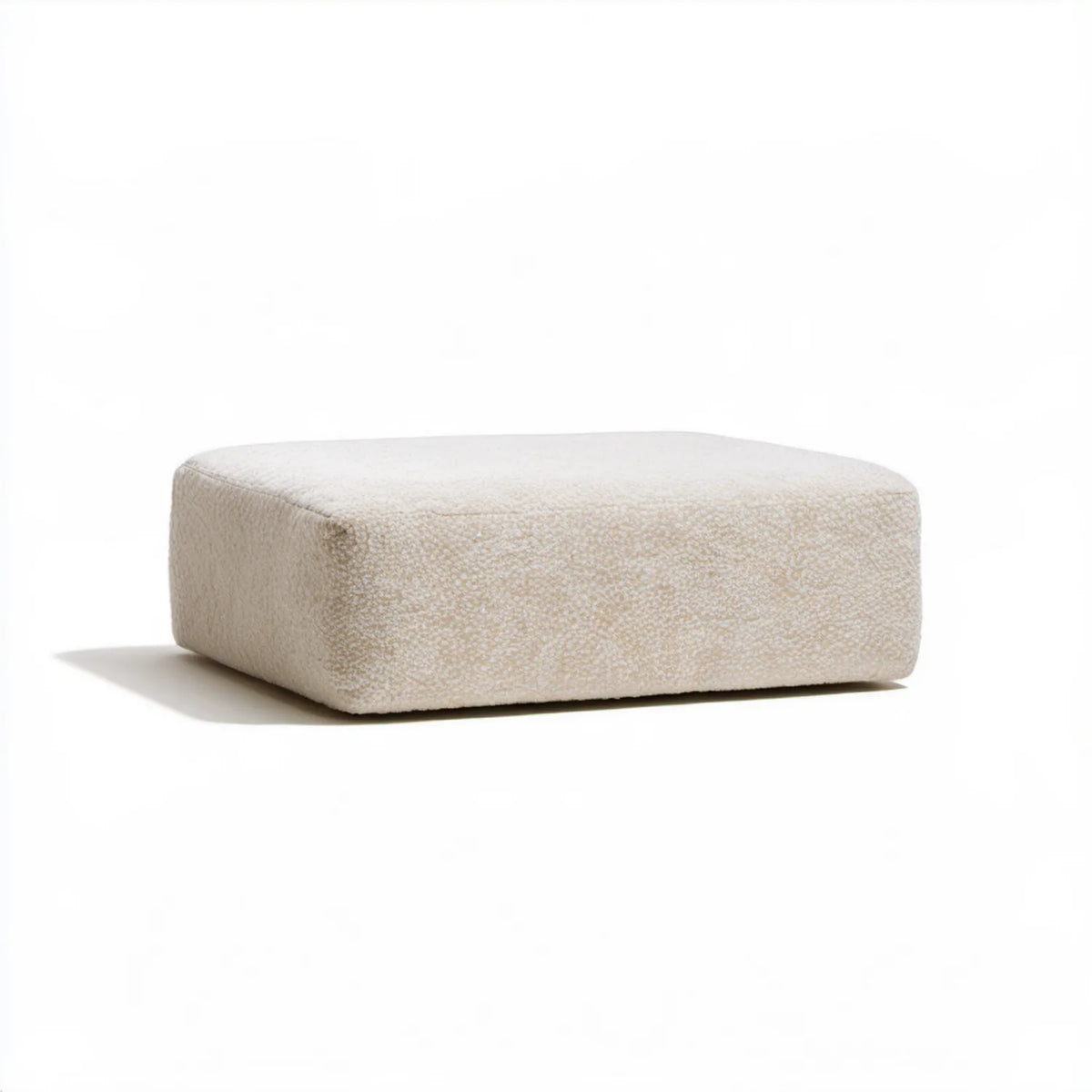 Kremowy puf kwadratowy z tkaniny bouclé 60 × 60 × 35 cm